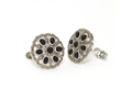Rhodium plated sterling silver Camelot cufflink with black onyx and 1.0 cts champagne diamonds.
